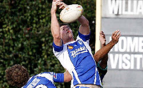 A Grafton Ghosts player flies for the football during last weekend’s close game against Marist Brothers. A Grafton Ghosts player flies for the football during last weekend’s close game against Marist Brothers.